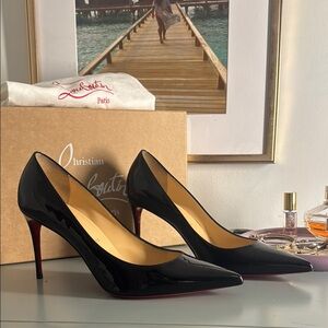 Christian Louboutin Black Heels with Pointed Toe and Stiletto Heel